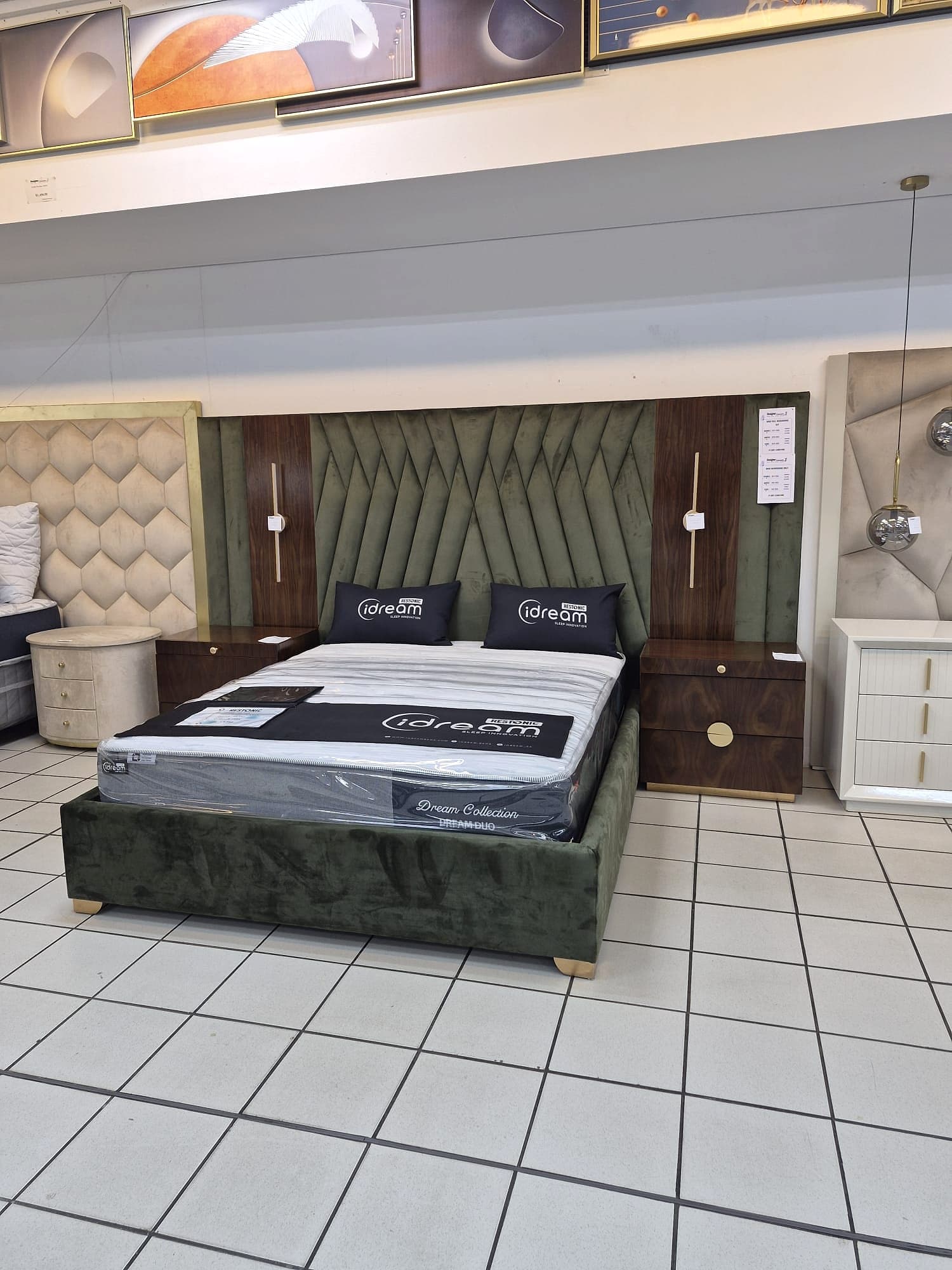 A custom green velvet chevron headboard by MicWood Furnitures
