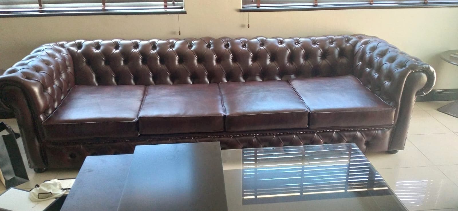 Brown leather Chesterfield sofa in the Lavish Haus showroom